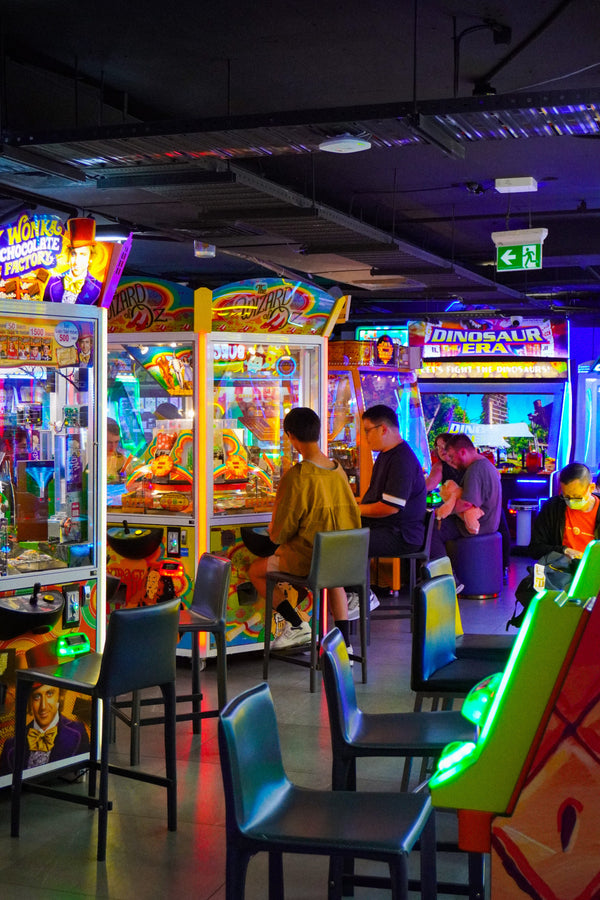 Busy arcade with claw machines and games